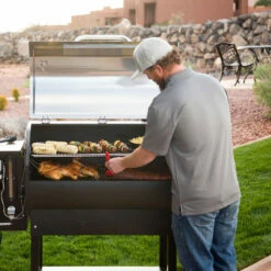 Camp Chef Woodwind 36 Wi-Fi & Bluetooth Controlled 36-Inch Pellet Grill 17 Camp Chef Woodwind 36 Wi-Fi & Bluetooth Controlled 36-Inch Pellet Grill -BBQDIRECT Shop Camp Chef Woodwind 36 Wi Fi and Bluetooth Pellet Grill PG36CL Lifestyle Man Cooking