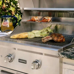 Coyote C-Series 28-Inch 2-Burner Built-In Propane Gas Grill 13 Coyote C-Series 28-Inch 2-Burner Built-In Propane Gas Grill -BBQDIRECT Shop Coyote C Series 28 Inch 2 Burner Built In Propane Gas Grill C1C28LP Lifestyle Close