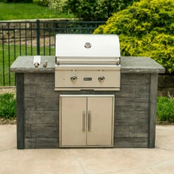 Coyote Ready-To-Assemble 5 Ft. Outdoor Kitchen Island For Natural Gas Grill And Access Door - Brown Weathered Wood 13 Coyote Ready-To-Assemble 5 Ft. Outdoor Kitchen Island For Natural Gas Grill And Access Door - Brown Weathered Wood -BBQDIRECT Shop Coyote Ready To Assemble 5 Ft Outdoor Kitchen Island Brown Weathered Wood RTAC G5 WB Lifestyle