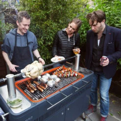 Everdure By Heston HUB 54-Inch Freestanding Charcoal Grill With Rotisserie 13 Everdure By Heston HUB 54-Inch Freestanding Charcoal Grill With Rotisserie -BBQDIRECT Shop Everdure by Heston HUB 54 Inch Freestanding Charcoal Grill with Rotisserie and Electronic Ignition HBCE2BUS Lifestyle 1