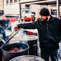 Gateway Drum Smokers Sizzle Edition 55 Gallon Charcoal BBQ Smoker - Gloss Royal -BBQDIRECT Shop Gateway Drum Smokers 55 Gallon Charcoal BBQ Smoker Lifestyle Cooking 2