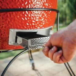 Kamado Joe Classic Joe II 18-Inch Charcoal Ceramic Kamado Grill -BBQDIRECT Shop Kamado Joe Classic Joe II 18 Inch Ceramic Grill KJ23RHC Lifestyle Ash Drawer Pulling Out