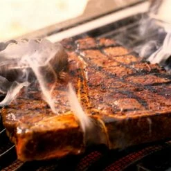 Napoleon Prestige 500 Natural Gas Grill With Infrared Rear Burner And Infrared Side Burner And Rotisserie Kit -Black 21 Napoleon Prestige 500 Natural Gas Grill With Infrared Rear Burner And Infrared Side Burner And Rotisserie Kit -Black -BBQDIRECT Shop Napoleon Prestige 500 RSIB Blacksearing steak on the high heat infrared side burner