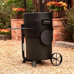 Oklahoma Joe's Bronco Pro Drum Charcoal Smoker - Black 20 Oklahoma Joe's Bronco Pro Drum Charcoal Smoker - Black -BBQDIRECT Shop Oklahoma Joes Bronco Pro Drum Charcoal Smoker Black 19202099 Rear View Lifestyle