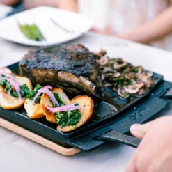 Ooni Dual-Sided Grizzler Plate -BBQDIRECT Shop Ooni Dual Sided Grizzler Plate UU P0A000 Lifestyle