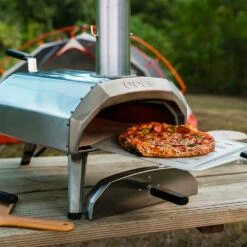 Ooni Karu 12 Multi-Fuel Powered Portable Outdoor Pizza Oven 14 Ooni Karu 12 Multi-Fuel Powered Portable Outdoor Pizza Oven -BBQDIRECT Shop Ooni Karu 12 Multi Fuel Powered Portable Outdoor Pizza Oven UU P0A100 Lifestyle