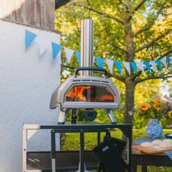 Ooni Karu 16 Multi-Fuel Powered Portable Outdoor Pizza Oven 14 Ooni Karu 16 Multi-Fuel Powered Portable Outdoor Pizza Oven -BBQDIRECT Shop Ooni Karu 16 Multi Fuel Powered Portable Outdoor Pizza Oven UU P0A100 Lifestyle
