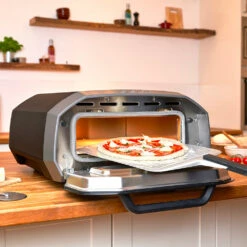 Ooni Volt 12 Electric Portable Outdoor Pizza Oven 13 Ooni Volt 12 Electric Portable Outdoor Pizza Oven -BBQDIRECT Shop Ooni Volt 12 Electric Portable Outdoor Pizza Oven UU VOLT Lifestyle