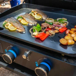 Pit Boss Grills Ultimate Lift-Off Series 50-Inch 2-Burner Freestanding/Tabletop Propane Gas Commercial Style Flat Top Griddle -BBQDIRECT Shop Pit Boss Grills Ultimate Lift Off Series 2 Burner Propane Flat Top Griddle PB2BGD2 Lifestyle 4