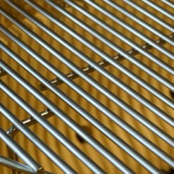 Primo All-In-One Oval JR 200 Charcoal Ceramic Kamado Grill 16 Primo All-In-One Oval JR 200 Charcoal Ceramic Kamado Grill -BBQDIRECT Shop Primo All In One JR 200 Oval Charcoal Ceramic Kamado Grill with Wheeled Stand and Side Shelves 7400 with Stainless Steel Grates Stainless Cooking Grates Detail