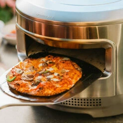 Solo Stove Pi 20-Inch Wood-Fired Round Portable Outdoor Pizza Oven 12 Solo Stove Pi 20-Inch Wood-Fired Round Portable Outdoor Pizza Oven -BBQDIRECT Shop Solo Stove Pi 20 Inch Wood Fired Round Portable Outdoor Pizza Oven PIZZA OVEN 12 Lifestyle Peel