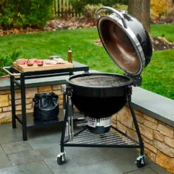 Weber Grills Summit 24-Inch Kamado E6 Charcoal Grill With Stand - Updated Model -BBQDIRECT Shop Weber Grills Summit 24 Inch Kamado E6 Charcoal Grill 18201001 Lifestyle 1